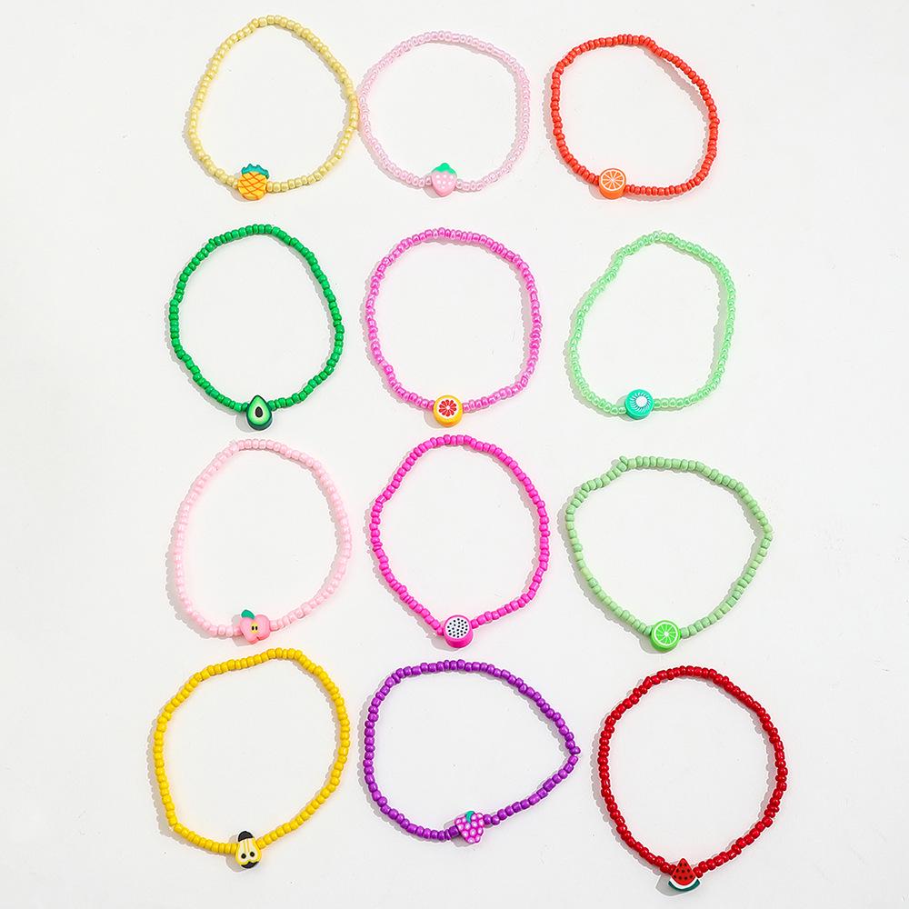 12-Piece Bohemian Rainbow Clay Fruit Bracelet Set: Strawberry, Watermelon, Grapefruit