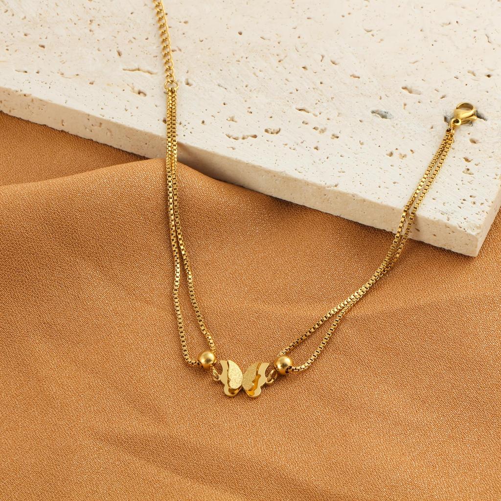 Modeankelkätting för damer med dubbla lager fjärilsdekoration, Klassisk snygg design i guld och silver, Hypoallergent rostfritt stål