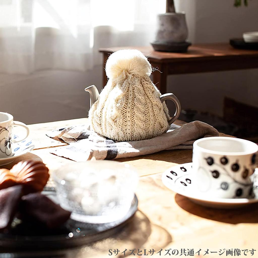 This Smoked Tea Cozy from the Home of Authentic British Tea, Fits 4 Cups (1200ml), Is Made In England from 100% Wool and Cable Knit. The Carefully