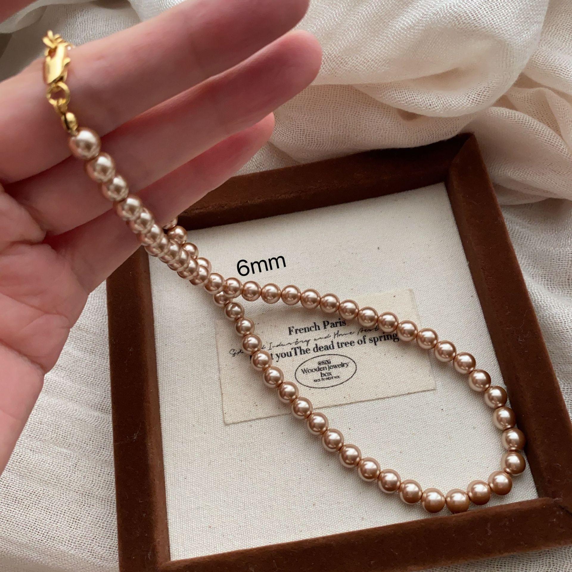 

Champagne pearl necklace fever Shijia neck chain French unique retro mini summer