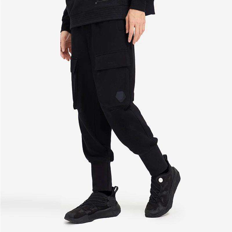 Li Ning Li Ning X Jackie Chan Stickade Sweatpants Herr Ecru AKLSC21-2