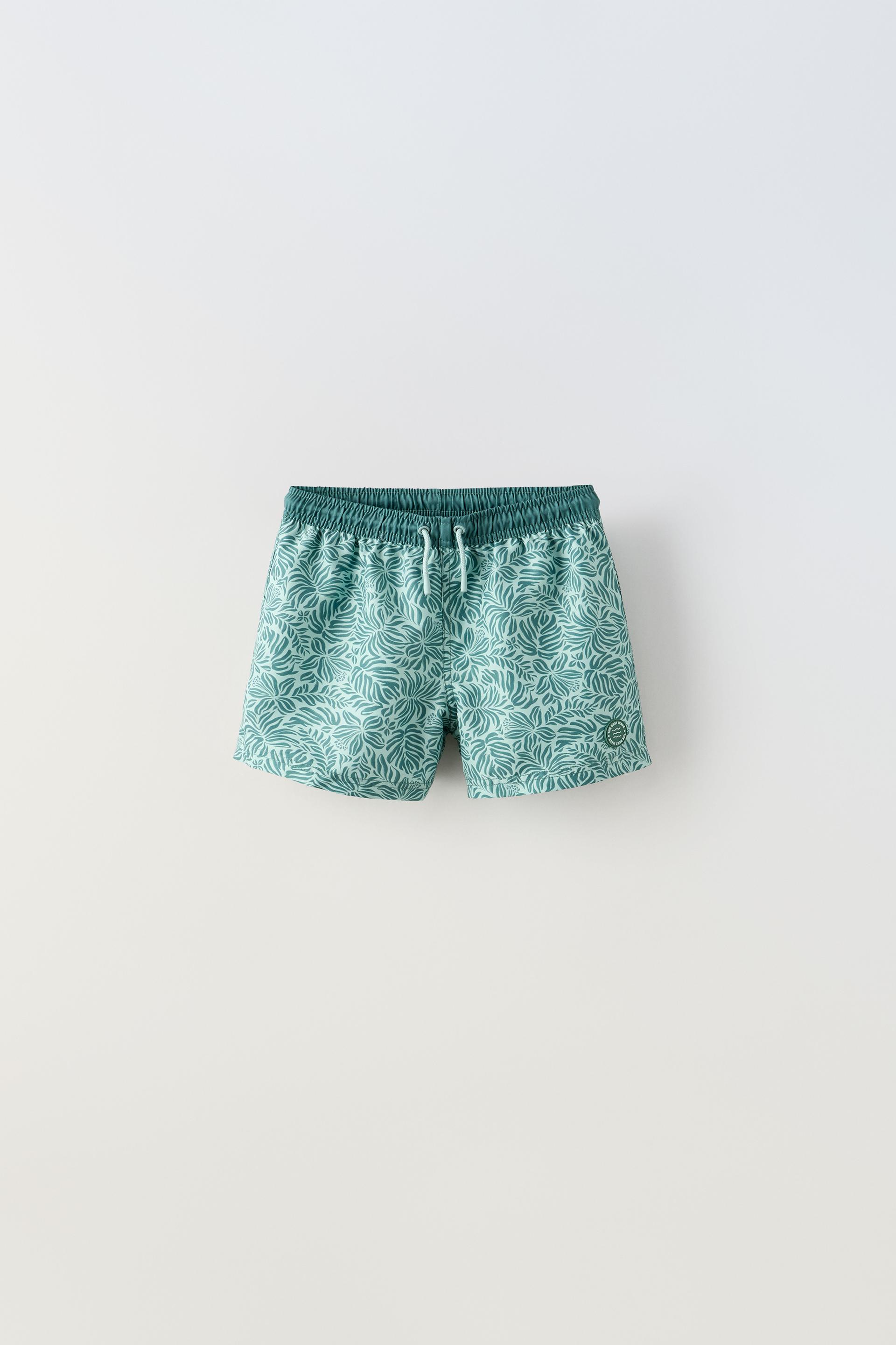 

6–14 ЛЕТ/ ШОРТЫ ДЛЯ ПЛАВАНИЯ С ПРИНТОМ ЛИСТЕЙ