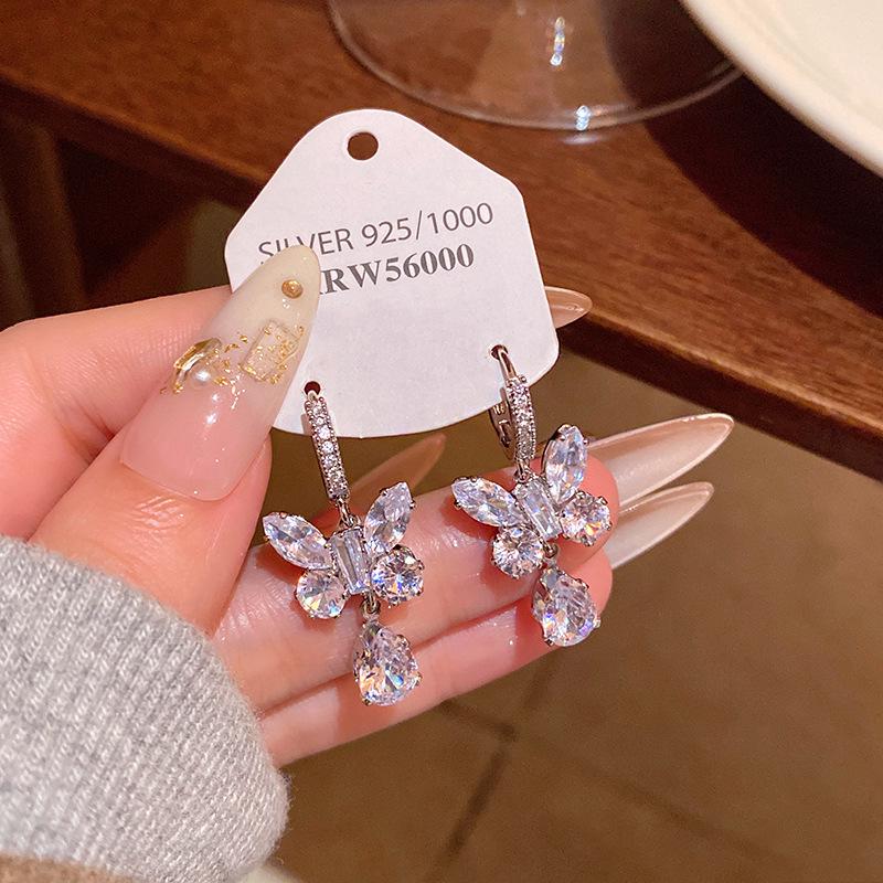 2025 Trendy Korean Micro-Inlaid Zircon Bow Earrings with S925 Silver Needle and Pearl for Women