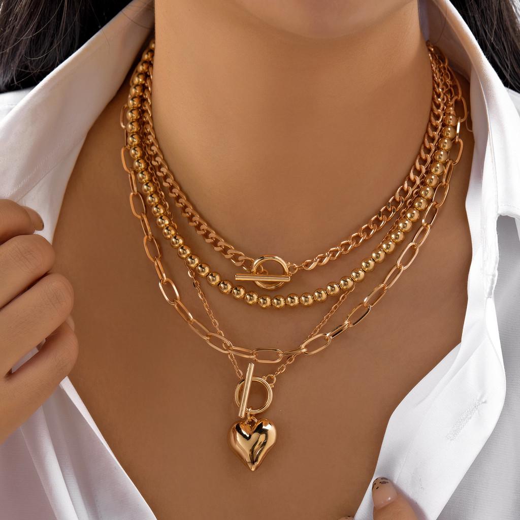 Collier Pendentif Multicouche Géométrique Cœur Étoile Pièce de Monnaie pour Hommes Femmes Style Noir Or Argent