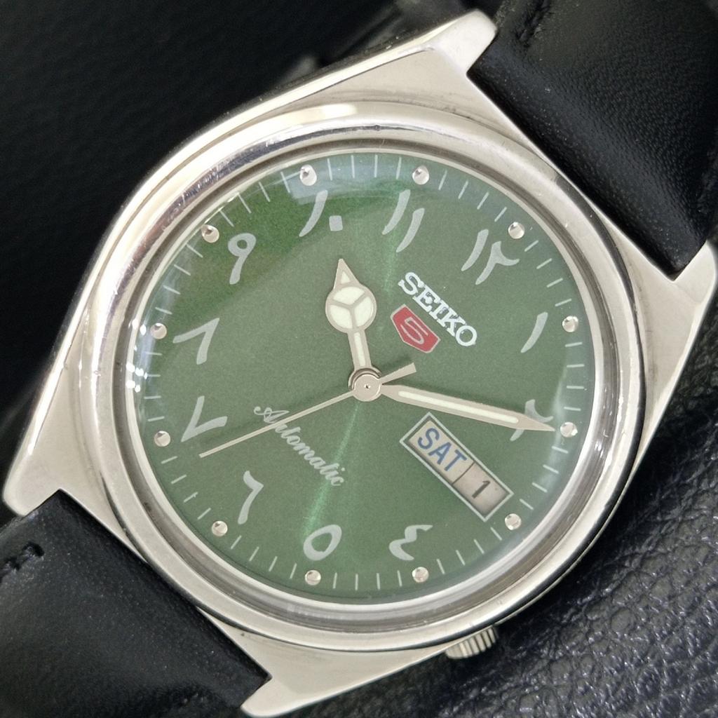 

VINTAGE SEIKO 5 AUTOMATIC 7009A JAPAN MENS ARABIC GREEN DIAL WATCH a702671-1 R209-a702671