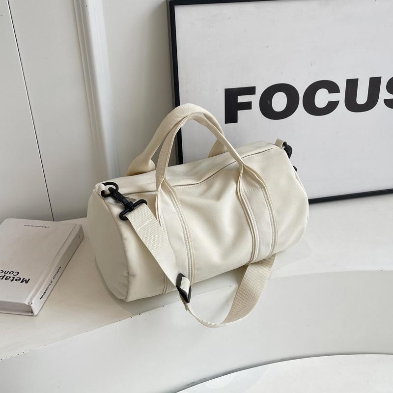 Niche nylon bucket bag simple Korean version 2025 new casual shoulder messenger bag versatile foreign style hand bag