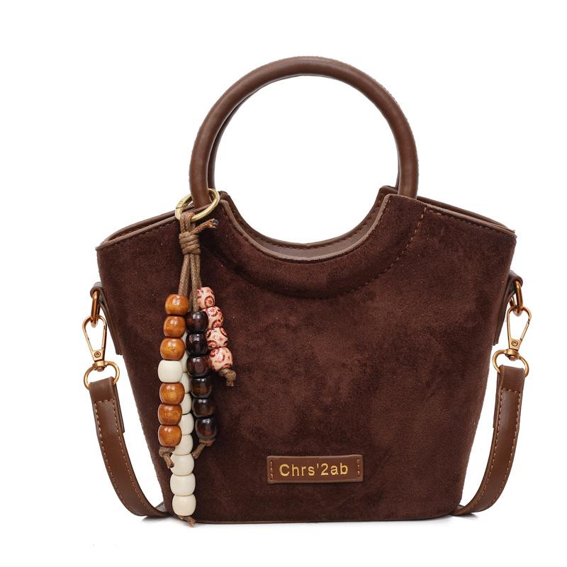 

Vintage handbag fashion bucket bag women s 2025 winter new popular leopard print shoulder bag commuter messenger bag темно-коричневого