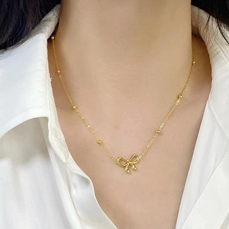 Elegant Japanese & Korean Bow Necklace: Trendy Titanium Steel Light Luxury Clavicle Chain for Women