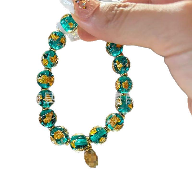 Green Tara Gold Foil Glass Bead Bracelet with Crushed Gold and Scenic Charm