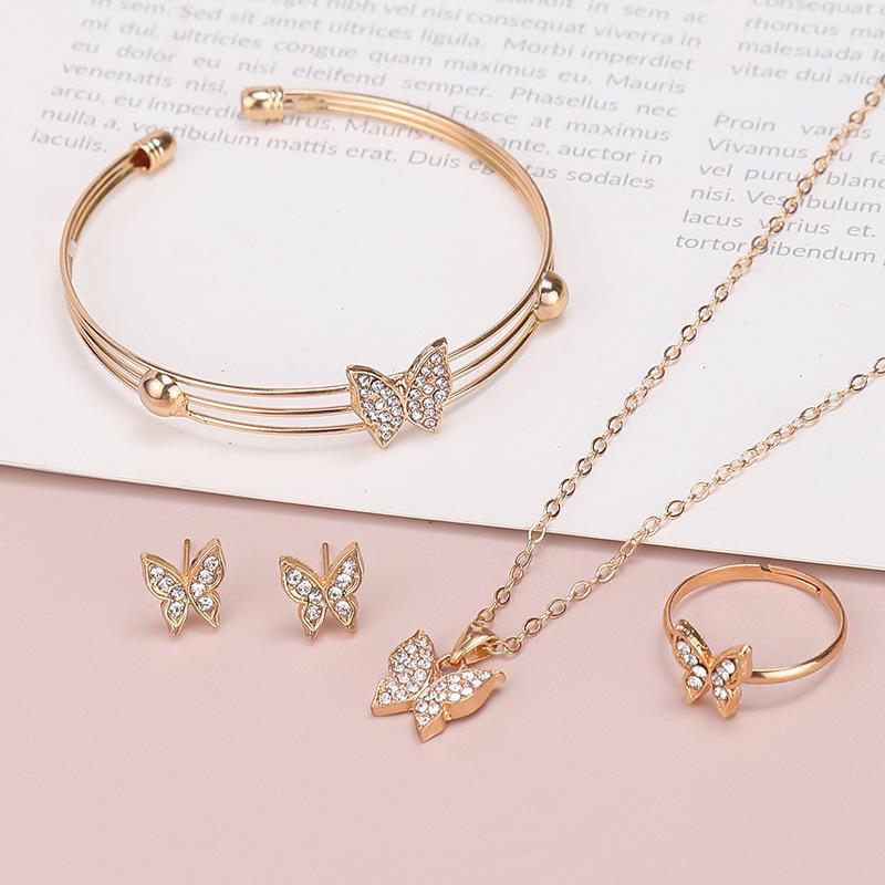 

Elegant Heart & Butterfly Jewelry Set for Women: Stylish European & American Design with Stud Earrings, Ring, Bracelet, and Necklace.