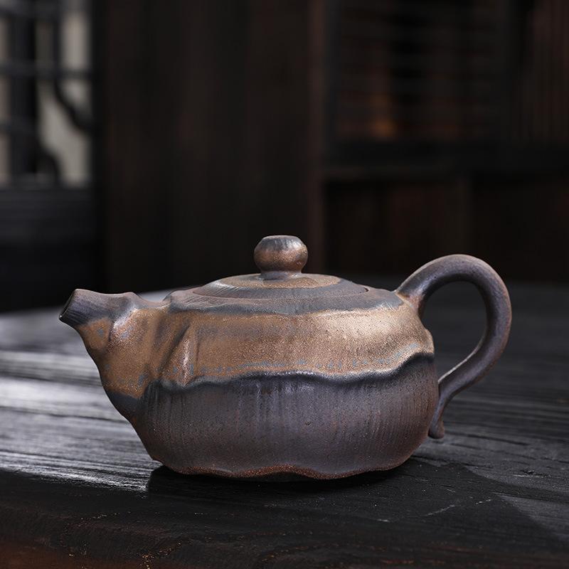 Stoneware teapot gilt iron glaze ceramic filter household teapot old rock mud pot kung fu tea set tea separation