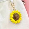 Handcrafted Sunflower Keychain: Colorful Smiley Face Bag Charm Pendant – Perfect for Bookbags or as a Decorative Gift.