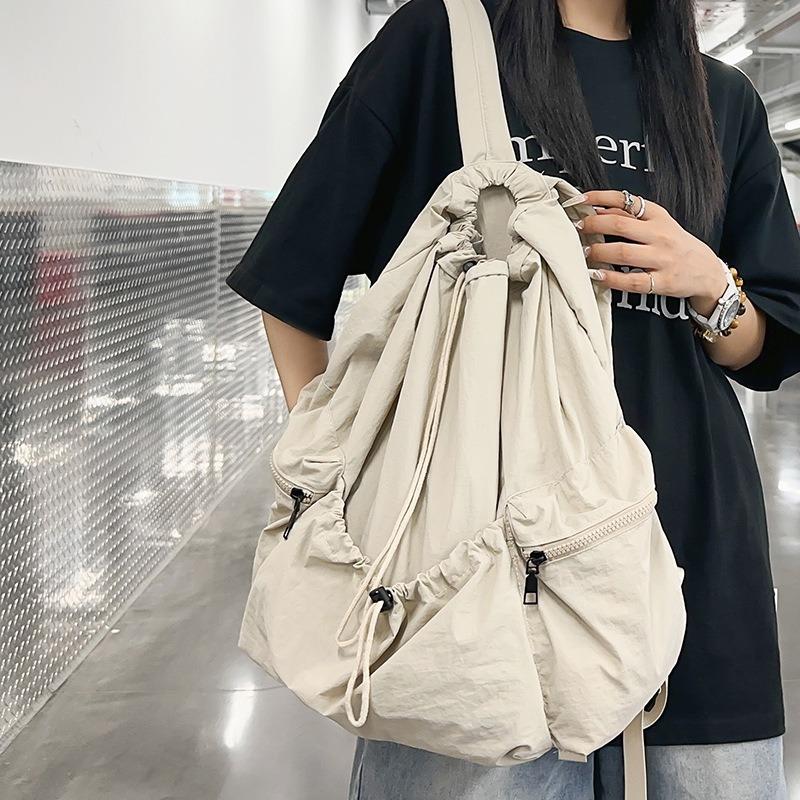 School bag new folding backpack multi-pocket bundle design simple solid color storage bag leisure travel couple backpack tide