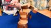 JELLYJELLYGAMES GoGo Woodman Wooden Action Balance Game for Ages 2-7 Players, 5+