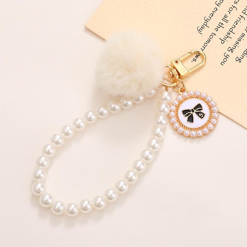 Schicke Perlenblumen-Anhänger Handyhülle & Handtaschenanhänger für Damen