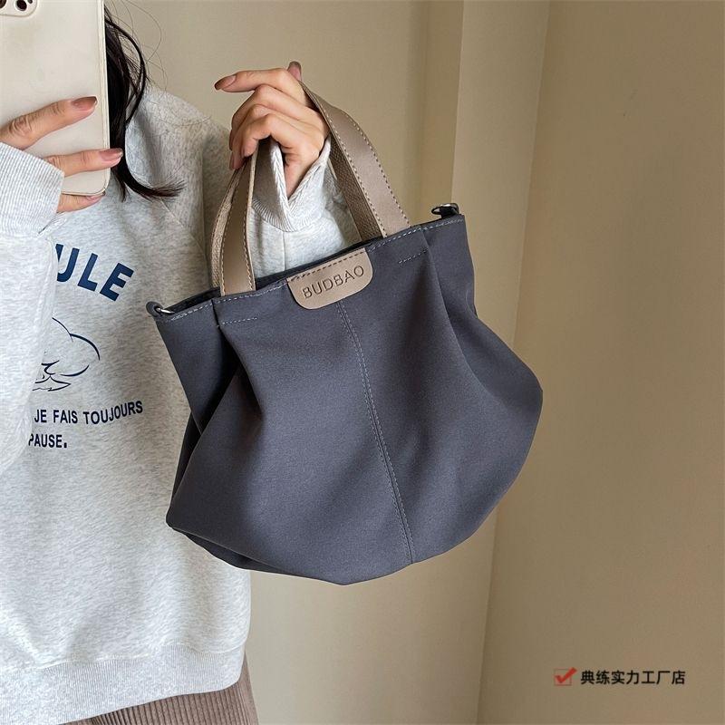 Casual canvas bag women's new versatile simple shoulder handbag fashionable large-capacity student class shoulder bag
