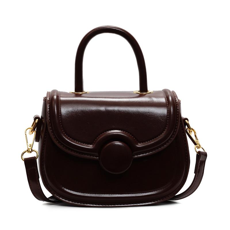 

Trendy new French casual niche simple style saddle bag versatile commuting temperament advanced sense portable messenger bag темно-коричневого