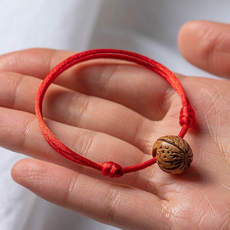 

Baby Peach Wood Amulet Baby Peach Kernel Red Rope Bracelet Braided Rope Shock-Proof and Shock-Proof Children Safe Carrying Strap Men Baby s brain pattern-peach basket