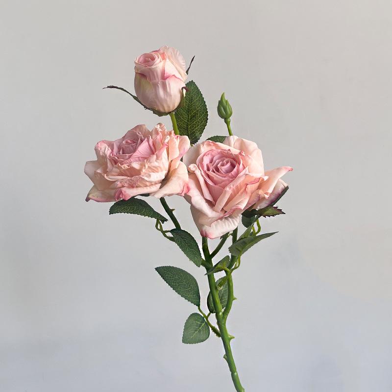 A Bouquet of Artificial Flowers with Three Tips and Scorched Edges, A Retro Home Living Room Decoration, and Dried Artificial Flowers