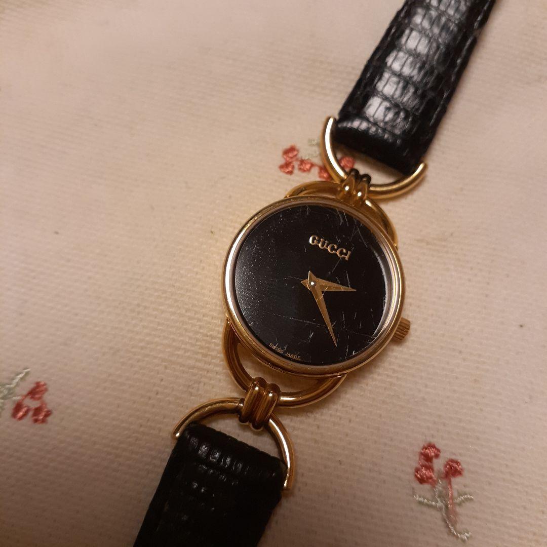Used GUCCI watch black dial gold
