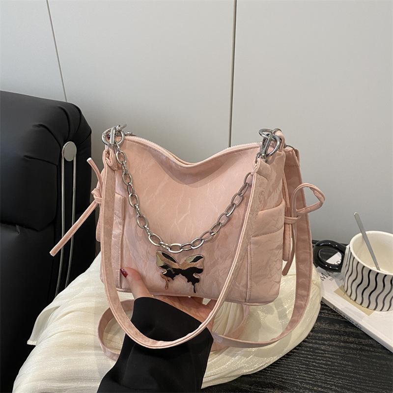 Korean version of fashion butterfly chain messenger bag women's 2025 summer new versatile hand carry shoulder armpit bag tide