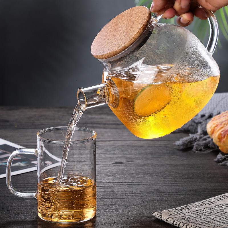 Transparente Glas Bambustasche Stahldeckel Kleine Kaltwasserkaraffe Große Saftgetränkekaraffe Gäste bewirten mit Weißem offenem Topf Kaltwasserkaraffe