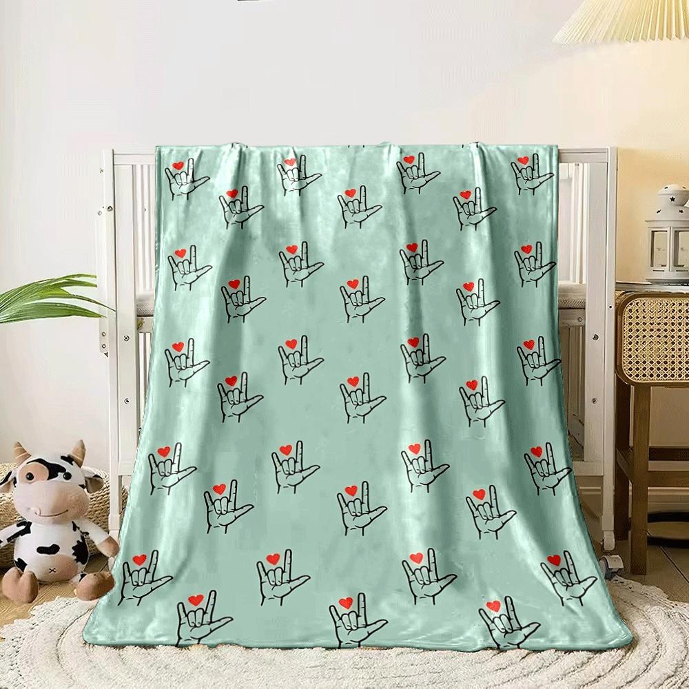 Pattern of hands making a love sign with red hearts on a green background. for all seasons blanket lunch break throw gift 80cm x 120cm