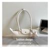 2026 French Light Luxury Cowhide Long Handle Dumpling Baguette Crossbody Bag