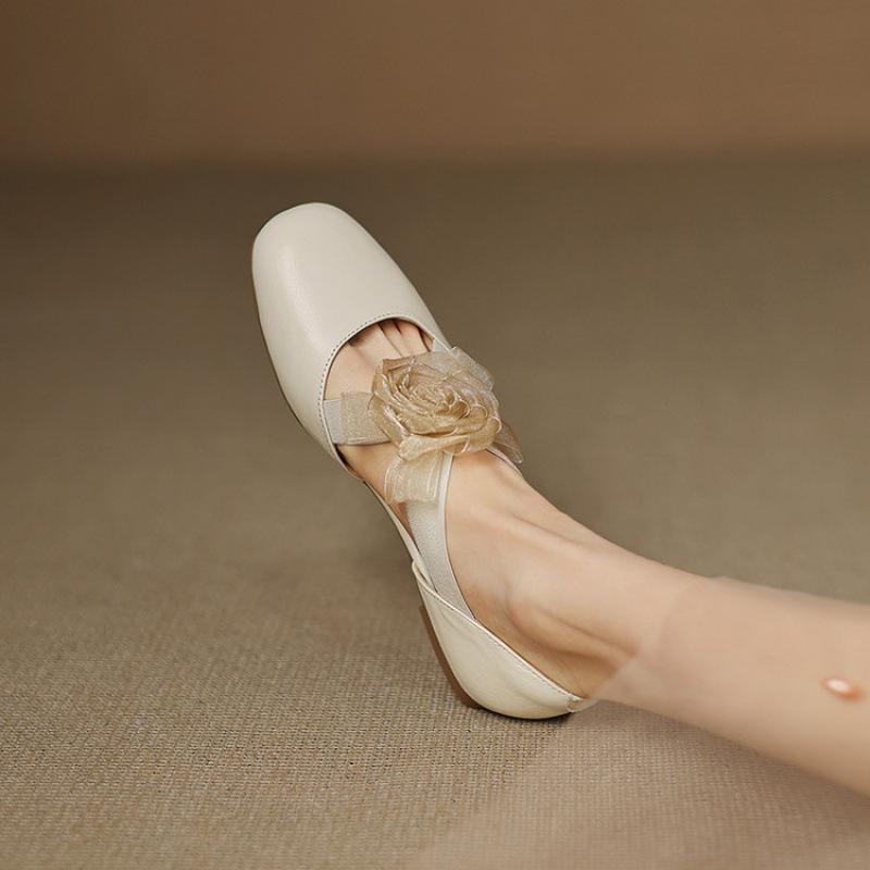 Summer Korean version of hollow sandals women's new flat-soled sandals cover feet and pedal leather round head low heel large size women's shoes