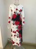 Elegant Plus Size Long Sleeve Printed Dress with Pockets and High Waist Hem