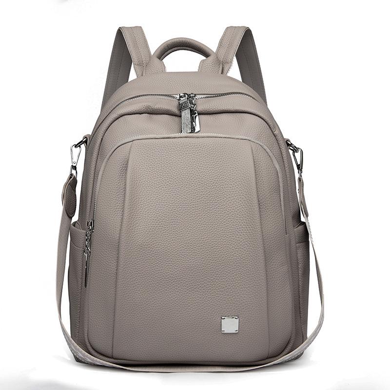 

2024 Новый женский мягкий кожаный рюкзак: Универсальная, модная, вместительная повседневная школьная и дорожная сумка через плечо