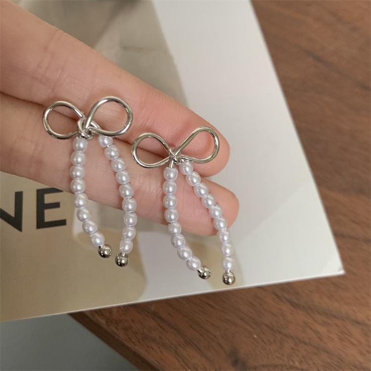 Elegant Retro Pearl Bow Earrings - Simple, Exquisite, and Stylish Ear Ornaments