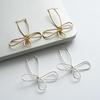 European and American Cold Metal Wind Flower Bow Ear Buckle Simple Fashion Earrings Niche High-end Earrings Women