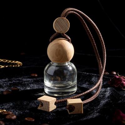 1Pcs Perfume Glass Bottle Empty Car Air Freshener Pendant With Wooden Caps Refillable Car Essential Oil Diffuser Bottle