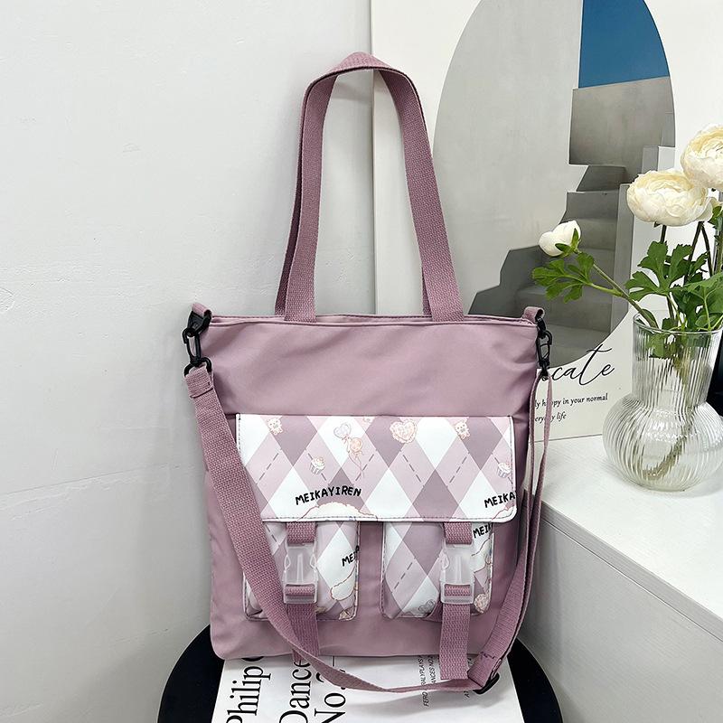 Large-capacity student tutoring bag, new women's bag, fashionable contrasting color messenger bag, shoulder bag.