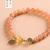 Sunstone bracelet for women, symbolizing the rising sun, love, and radiant light, with fragrant ash and glass beads
