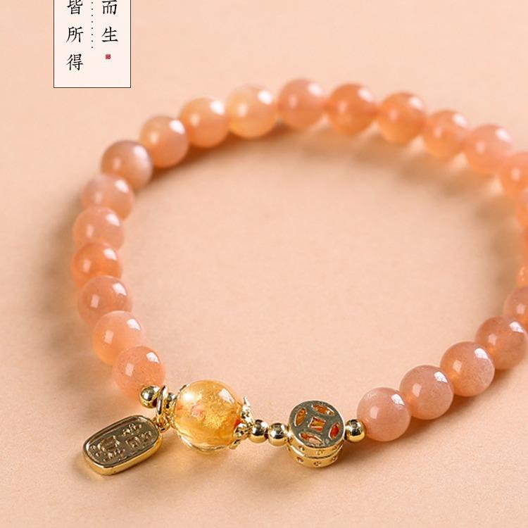 Sunstone bracelet for women, symbolizing the rising sun, love, and radiant light, with fragrant ash and glass beads