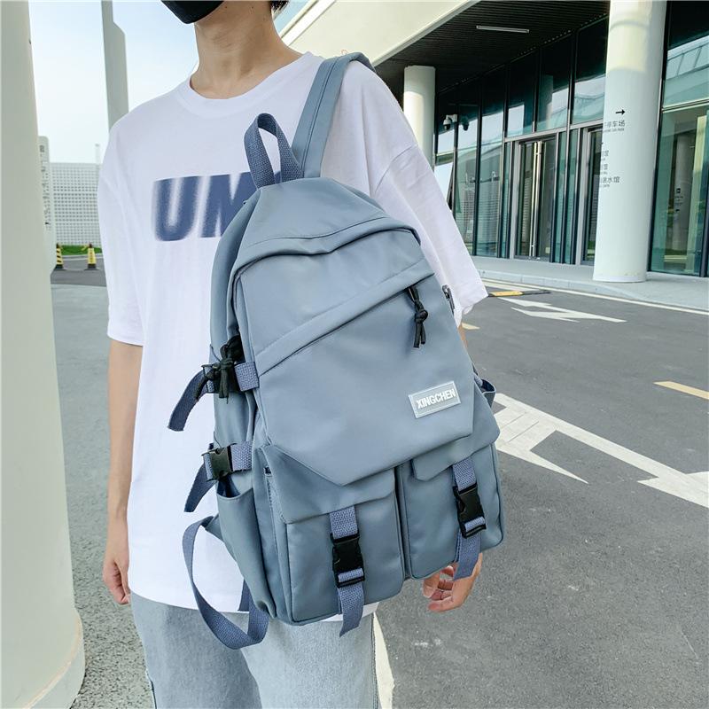 School bag male Korean version college student high school student large capacity junior high school student trend backpack female ins computer bag