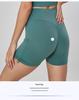 Bare-Feel High-Waisted Yoga Shorts: Butt-Lifting, Peach Drawstring, Three-Quarter Fitness Pants for Women.
