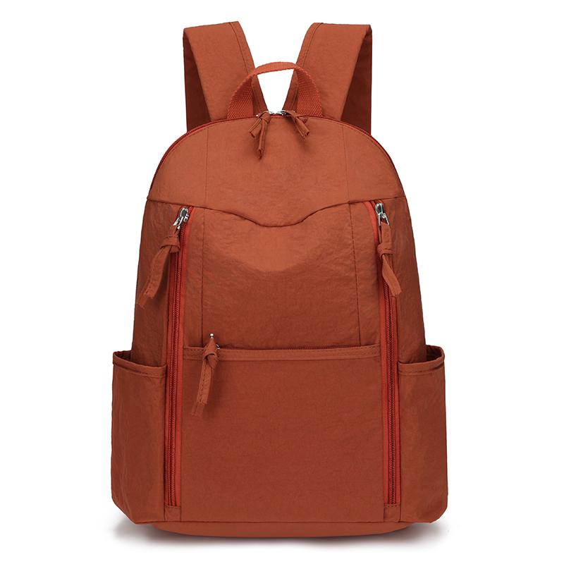 Рюкзак большой емкости через плечо, легкий водонепроницаемый дорожный рюкзак, нейлоновый портативный рюкзак, однотонный школьный рюкзак для школьников оранжевый