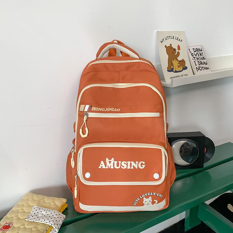 School bag Korean version big couple casual back high value teenager multi-compartment