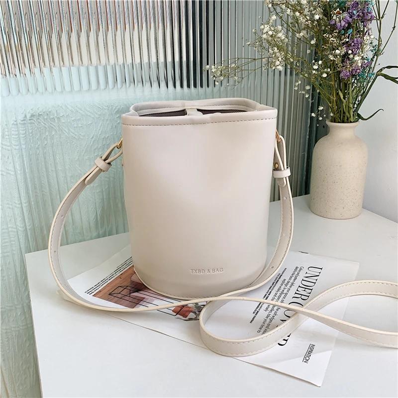 Women's PU Leather Crossbody Bags Contrasting Colors Casual Solid Trendy Lock Bucket Type
