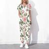 Women Plus Size White Floral Printed Scrub Set Cutout Neck Short Sleeve Pocket Top Long Pants Two Piece