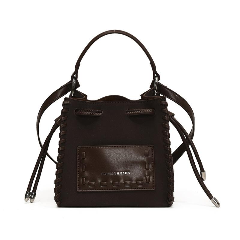 High-end Niche Bag Women's Autumn and Winter 2025 New Retro Fashion Messenger Bag Woven Portable Mini Bucket Bag