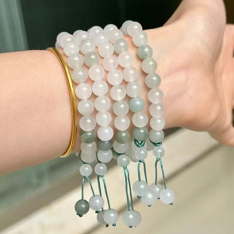 Women's Tianshan Gold Silk Jade Bracelet with White Floating Flower Design