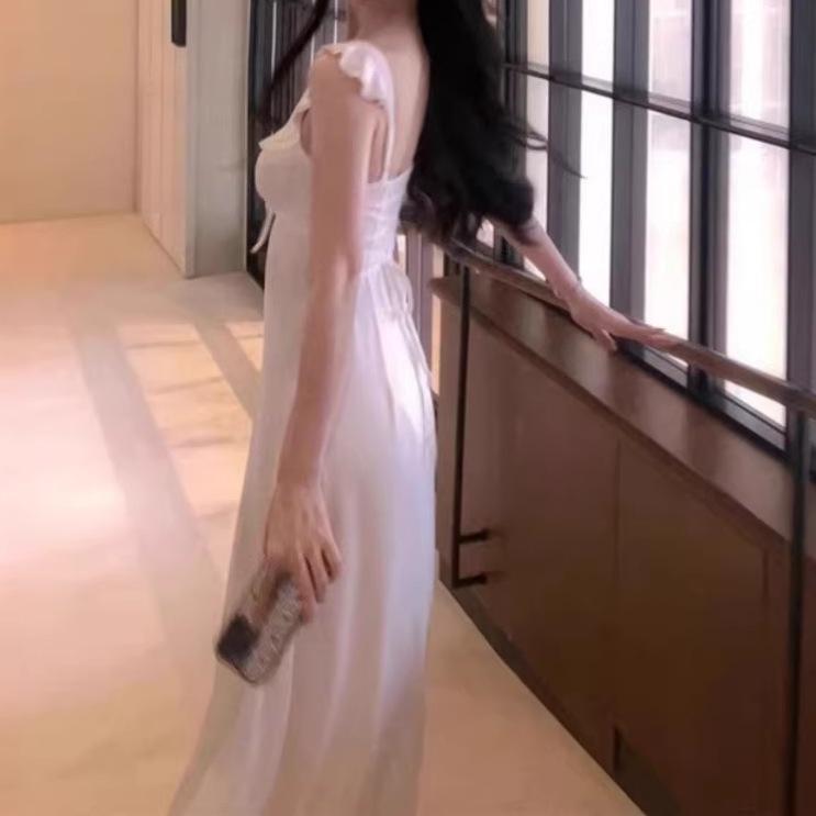 Elegant Women's White Backless Spaghetti Strap Long Dress - Summer 2026 Beach Vacation Style