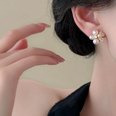 Romantic Zirconia Petal Pearl Stud Earrings: Unique, Beautiful, Light Luxury Flower Design for New Year.