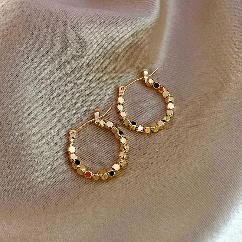 

2022 Trendy Korean Bean Metal Hoop Earrings - Hot Celebrity Style for Women серебряный