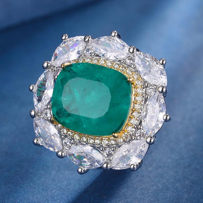 

Ювелирные изделия Медное основание с золотым покрытием Имитация цвета Сокровище Свет Роскошный Набор с разделением цвета Подвеска Кольцо 12 * 14