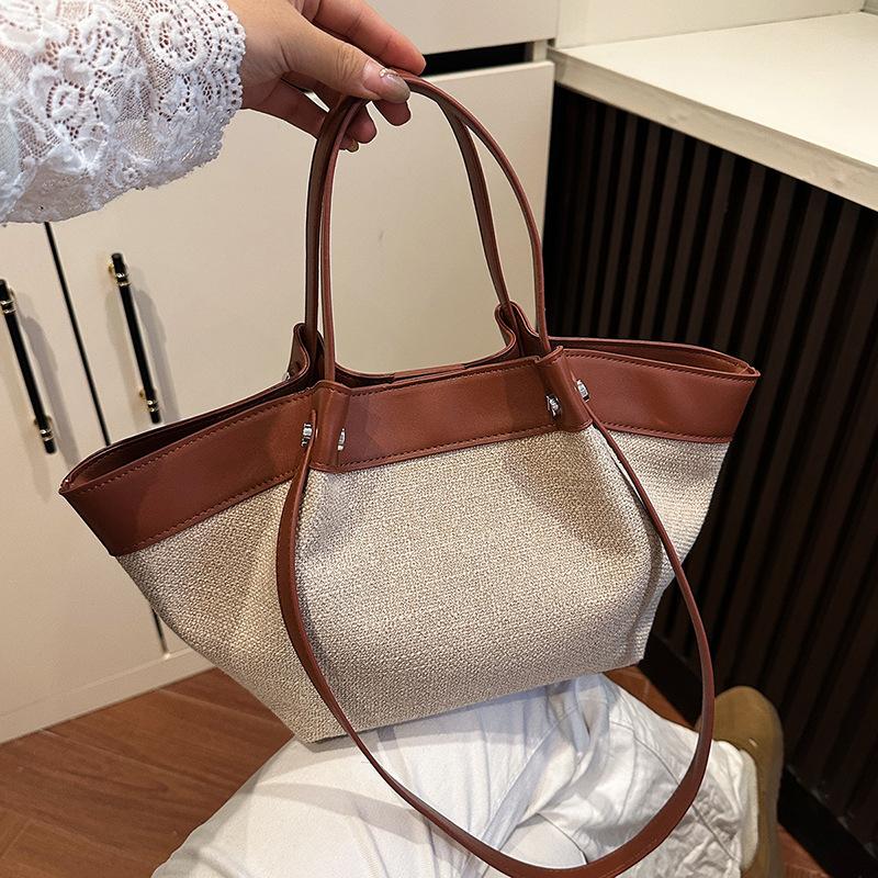 Spring new retro portable shoulder bag niche design canvas splicing large capacity tote bag